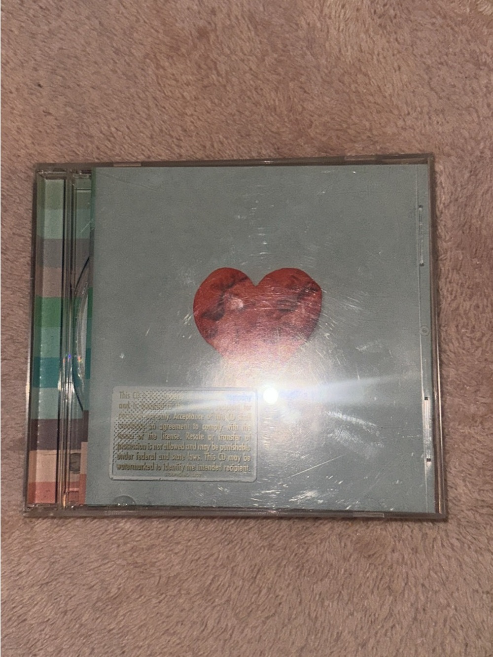 CD Case with Red Heart Cover Art